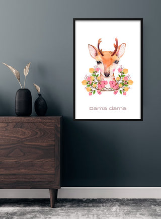 Children's poster of a cute deer with flowers, framed and hung on a wall above a wooden dresser.