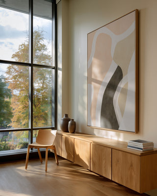 "Waves" by Martina Karlsson displayed in a modern room with wooden furniture and large windows.