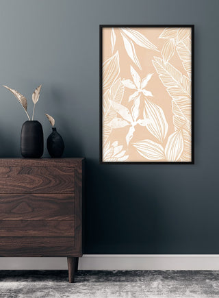 Framed White Leaves Plakat artwork on a beige background hanging above a wooden dresser in a modern room.