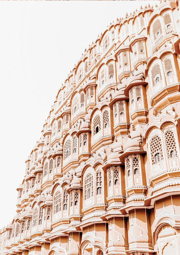 Old Indian palace facade with ornate windows and arches in warm, earthy tones. Wall art plakat design.