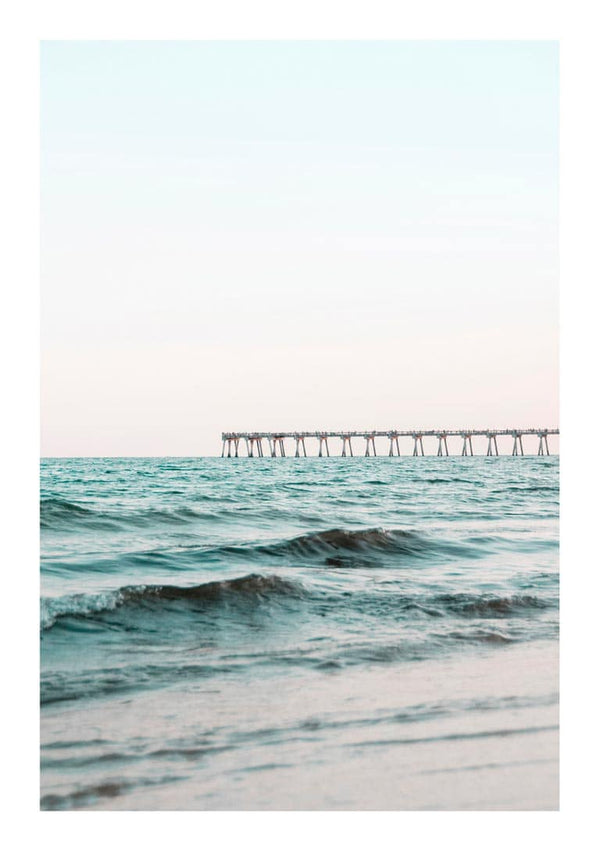 Long bridge extending over calm blue sea under a pastel sky, featured on the Long Bridge by the Sea Plakat.