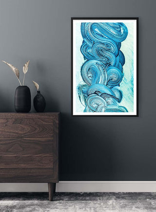 Blue Strokes Plakat artwork framed on a gray wall above a wooden dresser with decorative vases.