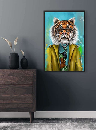 Framed artwork of a stylishly dressed tiger wearing sunglasses, displayed on a dark wall above a wooden dresser.