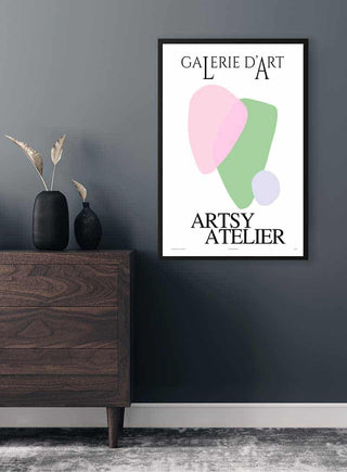 Framed Pink og Grøn Galerie D'art Plakat on a dark wall above a wooden dresser with vases.