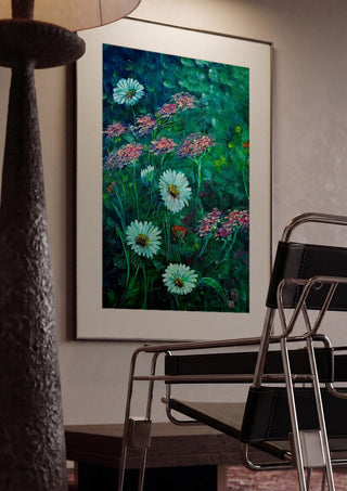 White Daisies and Yarrow by Svetla Stoyanova Bassi framed in a dim room beside a tubular steel chair