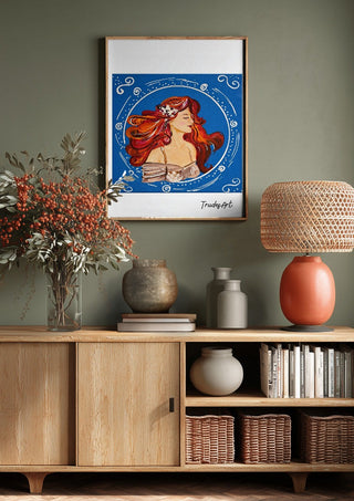 Luna in Blüte by Trude above a wooden sideboard on a sage green wall