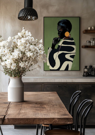 Form and Presence by ThingDesign in a black frame above a rustic table with white flowers
