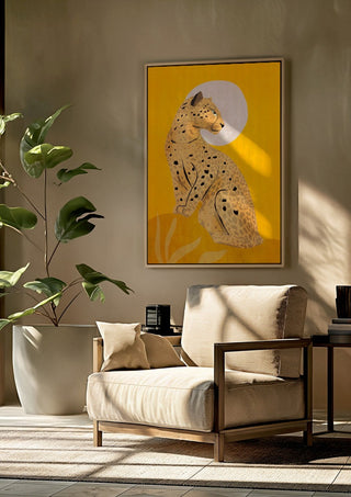 Leopard by ThingDesign framed above a beige armchair beside a potted plant