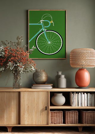 Italian Racing Bike - Detail by Bo Lundberg above a wooden sideboard on a sage green wall