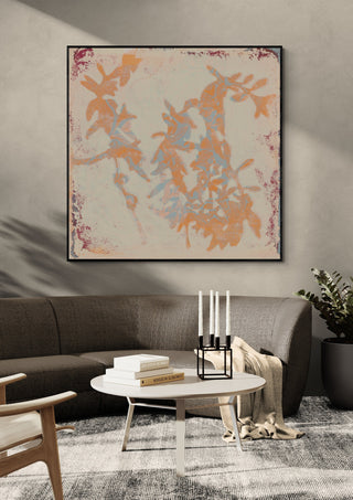 botanical poems 1 by Iris Lehnhardt in a black frame above a curved grey sofa with candlesticks on a round table