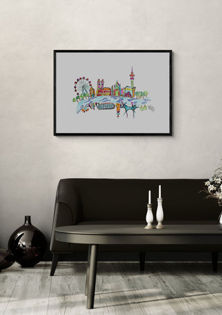 München by ullimcart in a black frame above a dark sofa with candlesticks on a round table