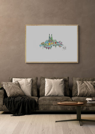 Köln II by ullimcart in a light oak frame above a grey sofa on a warm brown wall