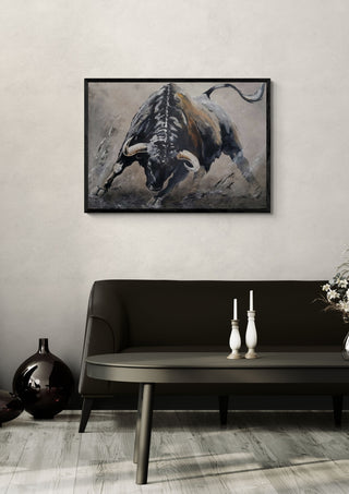 Unatamed spirit by Lüba in a black frame above a dark sofa with candlesticks on a round table