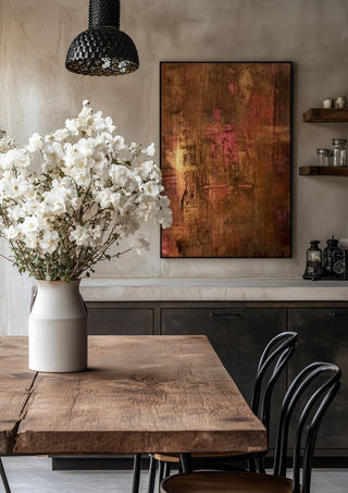 Copper and Rose by Kristof ellertz in a black frame above a rustic table with white flowers