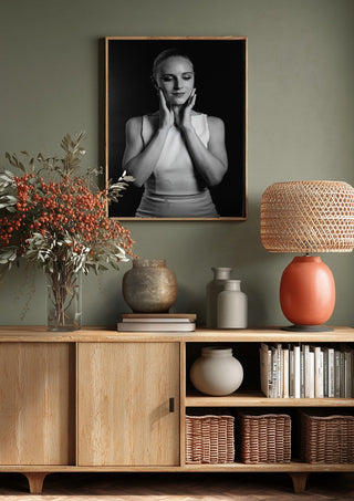 Quiet Light by Bettinafloorphoto above a wooden sideboard on a sage green wall