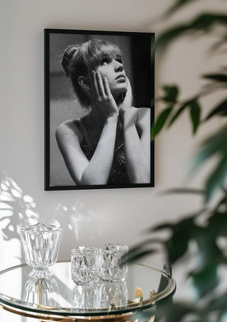 The Russian ballet dancer by Bettinafloorphoto in a black frame above a glass table with crystal glassware