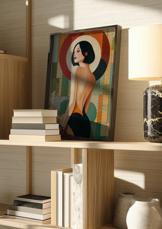 Golden Silence II by ArtySjak in a dark frame on a wooden shelf beside books and a lamp
