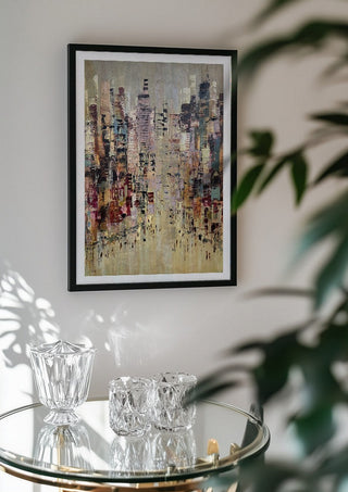 A Thousand windows by Art Anne Lee in a black frame above a glass table with crystal glassware
