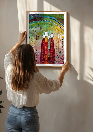 Fairy Tale 1 by Art Anne Lee being hung on a sunlit wall