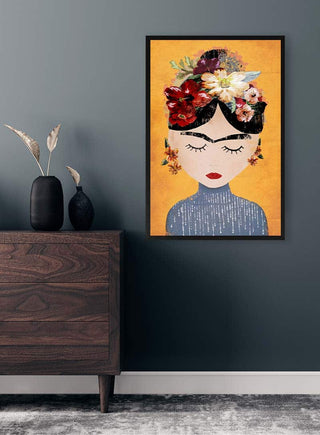 Colorful portrait of a woman with floral headpiece on yellow background, hanging above a wooden dresser.