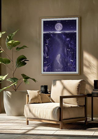 The Moon by Sciurus tarotus framed above a beige armchair beside a potted plant