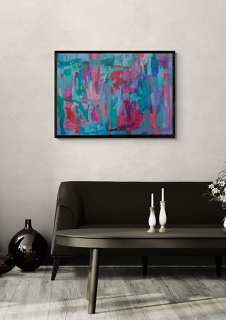 Transitions by Janet Bell in a black frame on a pale wall above a dark sofa with candlesticks