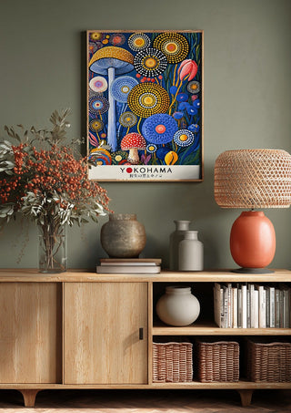 Dotted Garden at Night by Yokohama above a wooden sideboard on a sage green wall