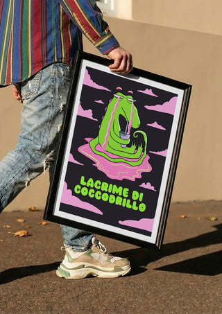 Crocodile Tears by Elisa Albanelli carried in a black frame along a sunny street