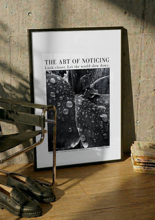after the rain II by hazelart in a black frame leaning against a concrete wall by a steel chair