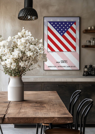 United States - Community Signal by Amadeus Fuchs in a black frame above a rustic table with white flowers