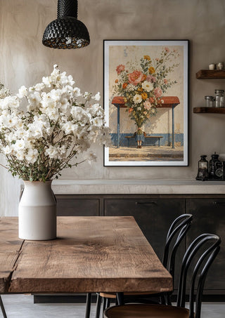 Spring Missed the Bus by Matthews Gallerie in a black frame above a rustic table with white flowers
