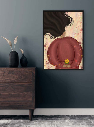 Framed "Where the Flower Goes" art by Kate Aitana hanging above a wooden dresser in a modern room.