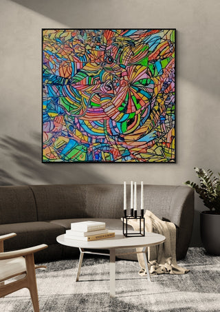 Colour Mosaic by Ronald Rumell in a black frame on a grey wall above a dark sofa with candlesticks