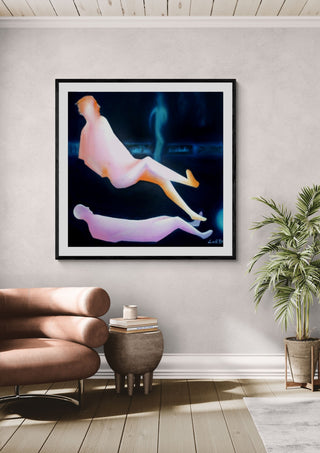 Contact #1 by Luis Valquaresma in a black frame above a pink armchair beside a potted palm