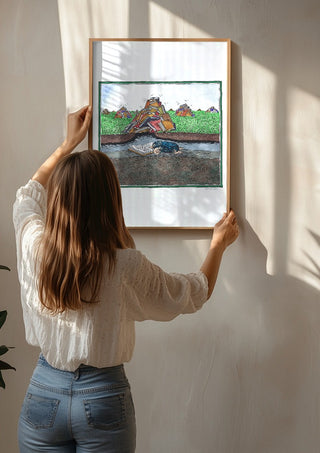 The Reading Mole by Waldemar Mandzel being hung on a sunlit wall