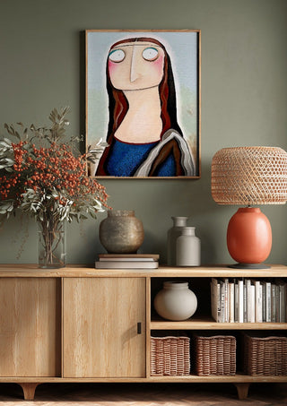 Mona Lisa by lacaluna above a wooden sideboard on a sage green wall