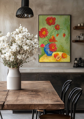 Poppies by Deblina Dey in a black frame above a rustic table with white flowers