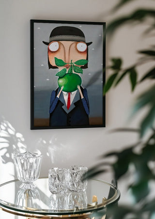 Die Apfelallergie by lacaluna in a black frame above a glass table with crystal glassware