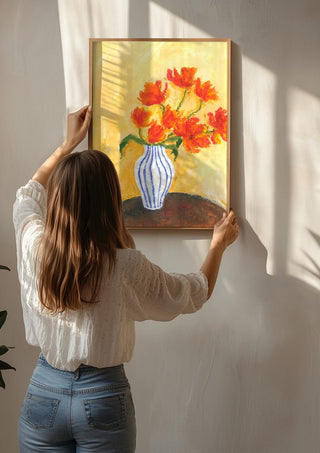 Tulips by Deblina Dey being hung on a sunlit wall