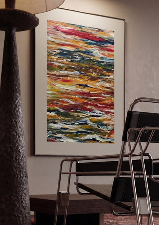 Feelings by Tonia framed in a dim room beside a tubular steel chair