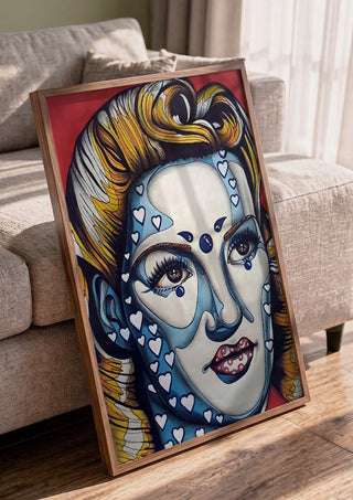Pinup Girl by Okiana in a walnut frame leaning against a grey sofa