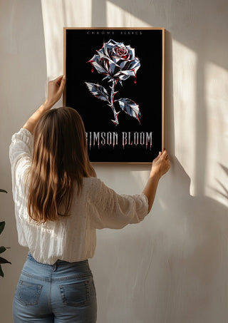 Crimson Bloom by Melancholy Machinations being hung on a sunlit wall
