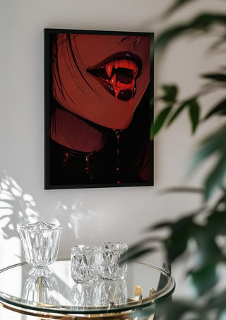 Let me taste you by Melancholy Machinations in a black frame above a glass table with crystal glassware