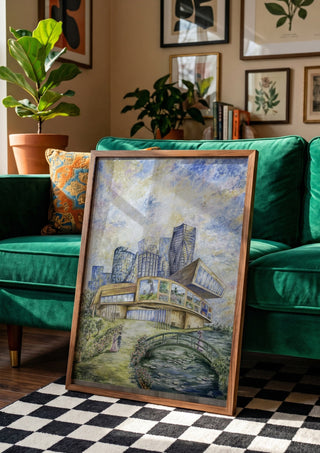 Modern Monet by Ramona’s art in a wooden frame beside a green velvet sofa on a chequered floor