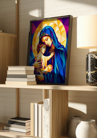 Virgin Mary and Baby Jesus by nyai in a dark frame on a wooden shelf beside books and a lamp