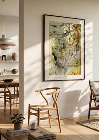 Dem jeg holder af by Henrik Kock in a black frame in a bright dining room with wooden chairs