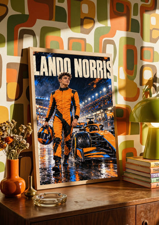 Lando Norris by Danii Steinfeldt in a wooden frame on a sideboard against retro patterned wallpaper