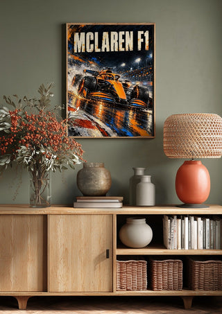 McLaren F1 by Danii Steinfeldt above a wooden sideboard on a sage green wall