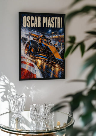 Oscar Piastri by Danii Steinfeldt in a black frame above a glass table with crystal glassware