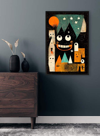 Monster Ville - Treechild art print featuring playful monster and geometric shapes hangs on a dark wall above a dresser.